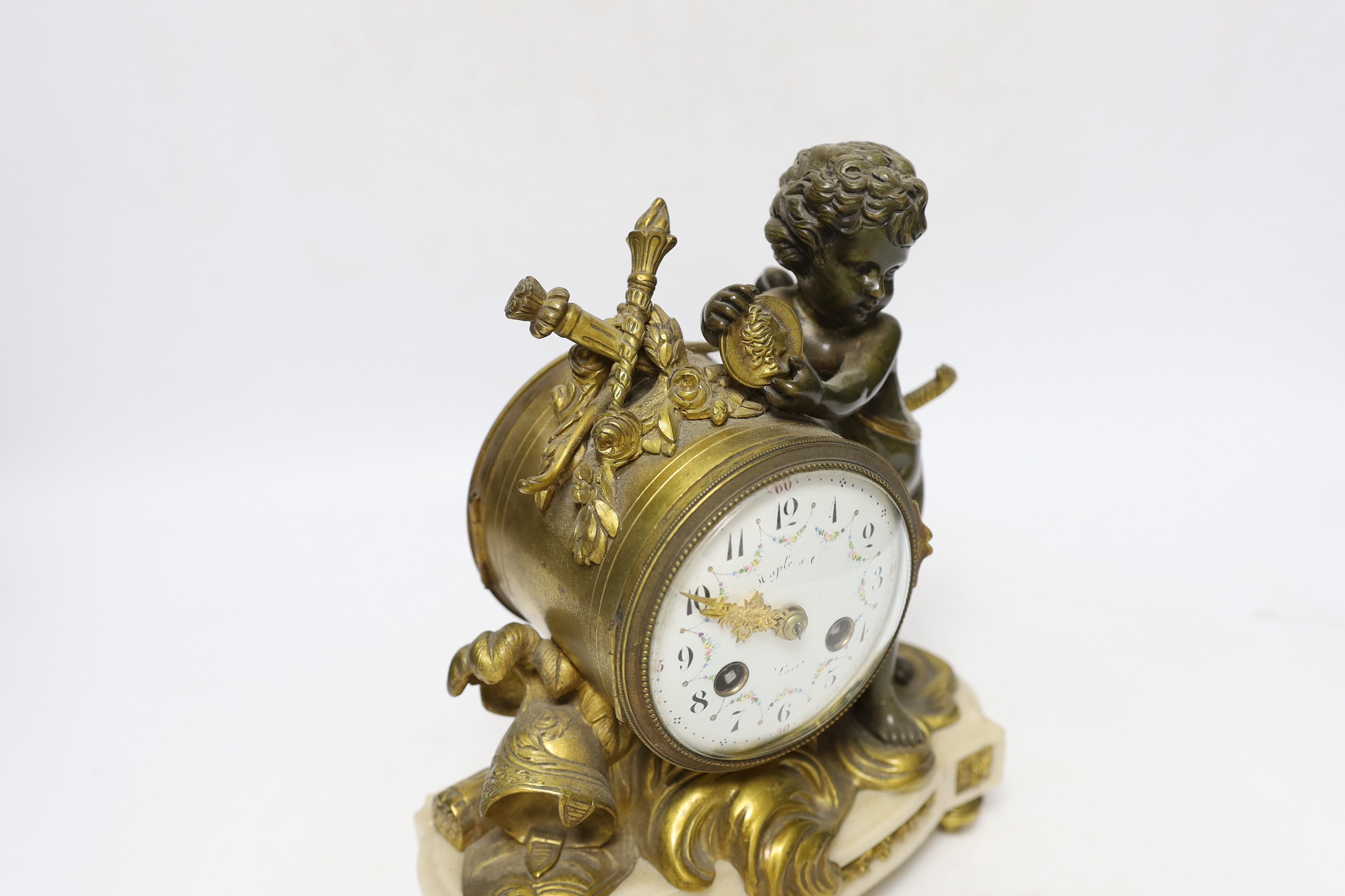A French ormolu and bronze mantel clock striking on a bell, 22cm high